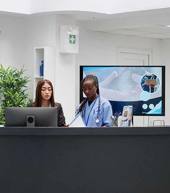 diverse-medical-team-working-at-hospital-reception-2026-01-08-02-17-06-utc
